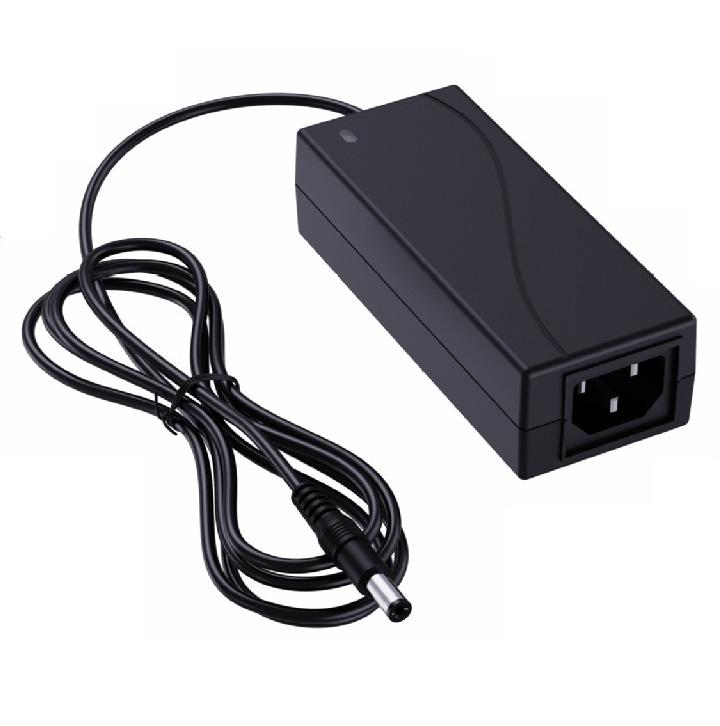 black universal AC to 24V 3A 72W DC desktop power adapter with male barrel connector and surge protector for laptop